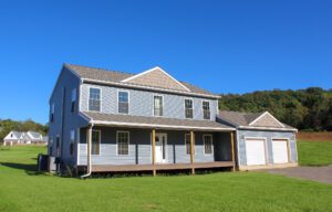 Newly built home with modern architecture and a well-maintained exterior, showcasing high-quality craftsmanship and attention to detail.